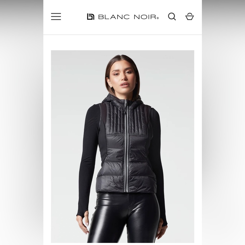 Blanc Noir Vest. Brand new. Tag is still on. Size Small. Black w/ reflective.